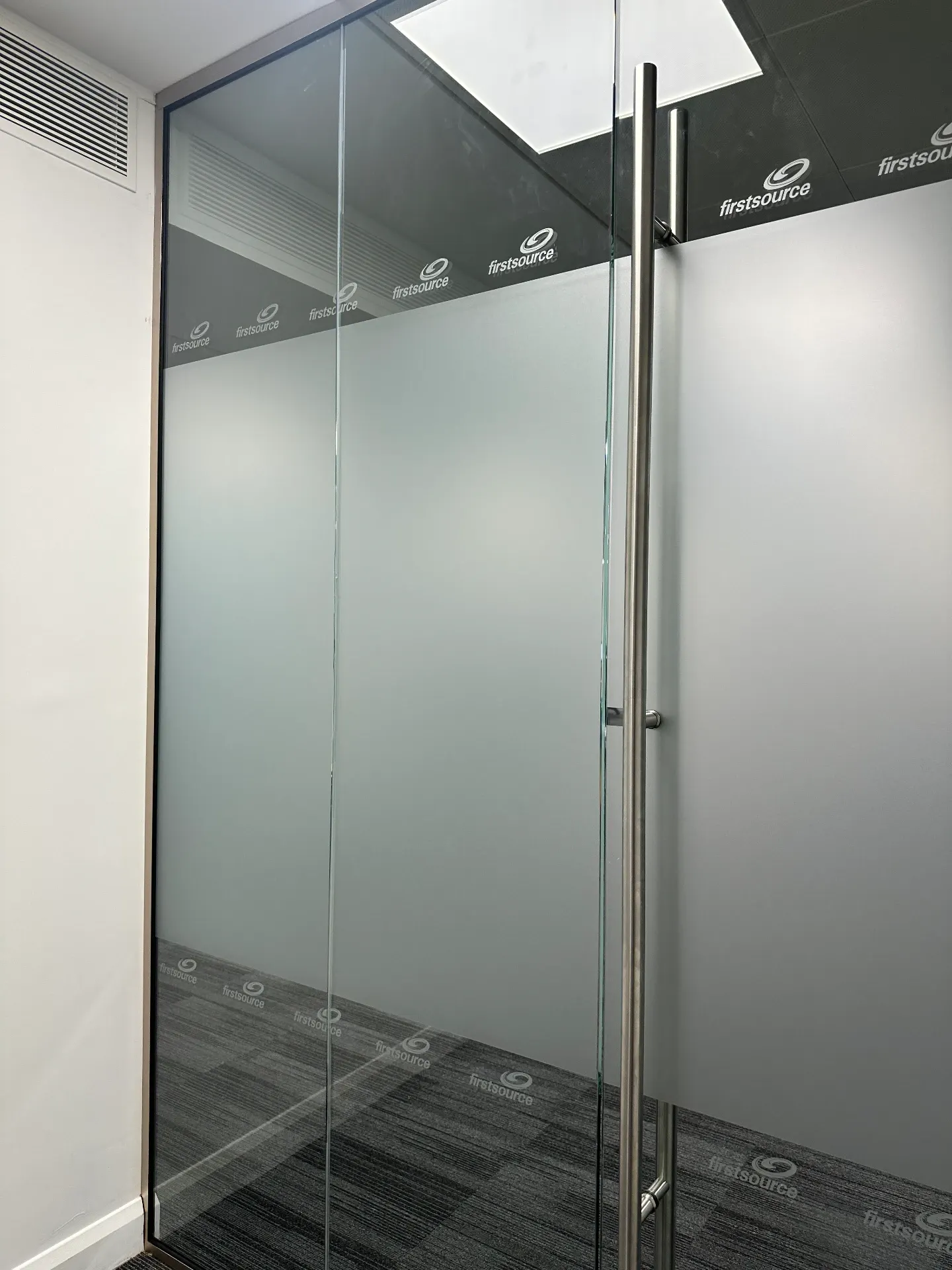 Mirrored external privacy tint, frosted privacy film and small cut logo manifestations — First Source Solutions, commercial signage by L4 Signs Glasgow