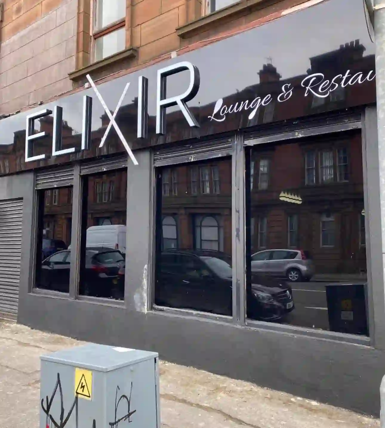 Blackout window film, fascia signage with raised lettering, vehicle livery — Elixir Lounge & Restaurant, commercial signage by L4 Signs Glasgow